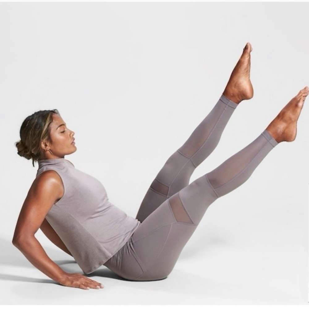 Athleta Meshblock Pocket Salutation Tight in Silver Bells size Medium Activewear